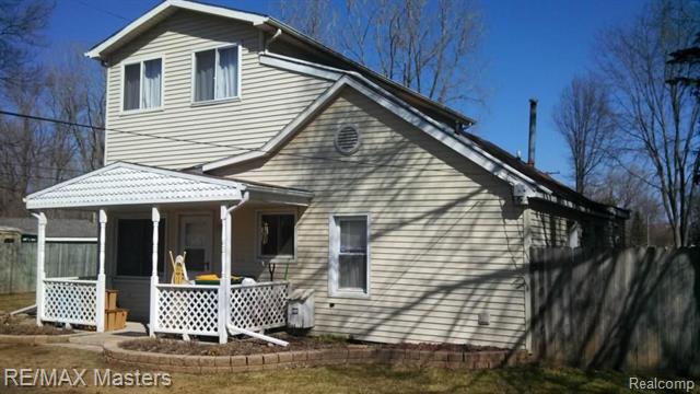 front view picture of 37450 S Huron Rd, New Boston, MI. 48164