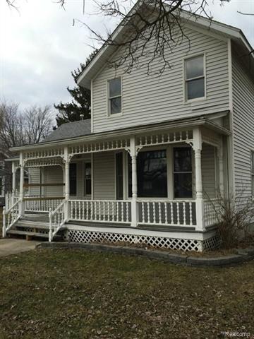 front view picture of 28203 Waltz Rd, New Boston, MI. 48164