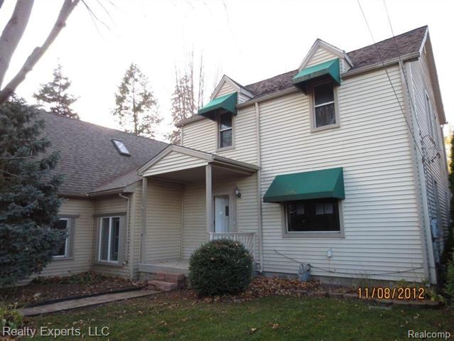front view picture of 25 Potter Dr, Belleville, MI. 48111