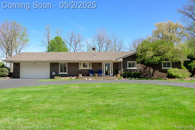 front view picture of 44119 Harmony Ln, Belleville, MI. 48111