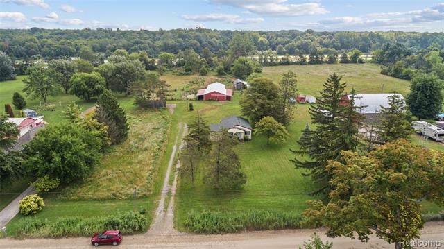 front view picture of 25245 Bell Rd, New Boston, MI. 48164