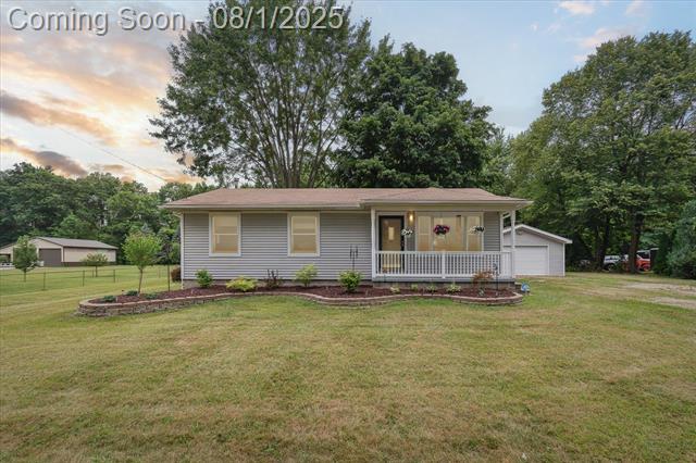 front view picture of 33650 Willow Rd, New Boston, MI. 48164