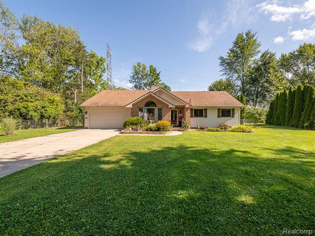 front view picture of 24433 Dugan Dr, New Boston, MI. 48164
