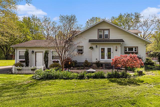 front view picture of 22128 Bell Rd, New Boston, MI. 48164
