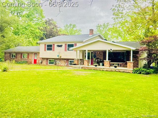 front view picture of 22191 Bell Rd, New Boston, MI. 48164