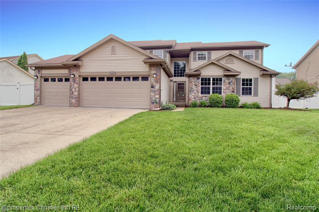 front view picture of 18594 Lawrence Lane, New Boston, MI. 48164