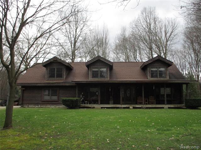 front view picture of 21435 Merriman Rd, New Boston, MI. 48164