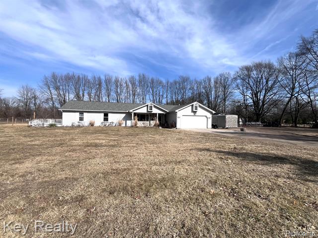 front view picture of 40030 Willis Rd, Belleville, MI. 48111