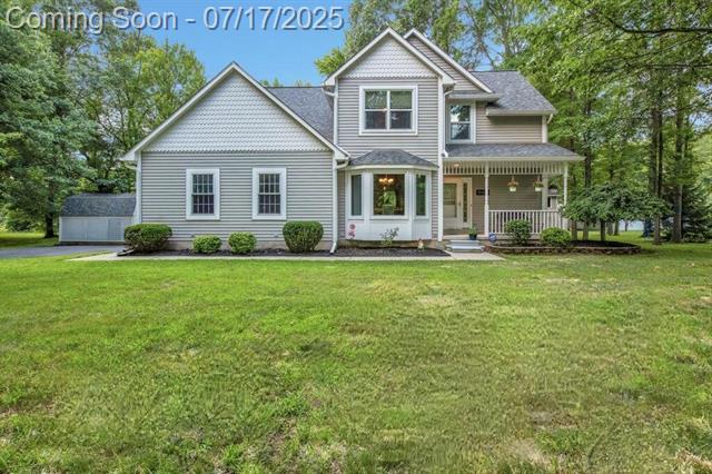 front view picture of 18460 Savage Rd, Belleville, MI. 48111