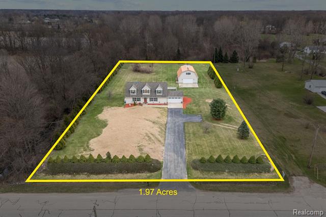 front view picture of 18111 Elwell Rd, Belleville, MI. 48111