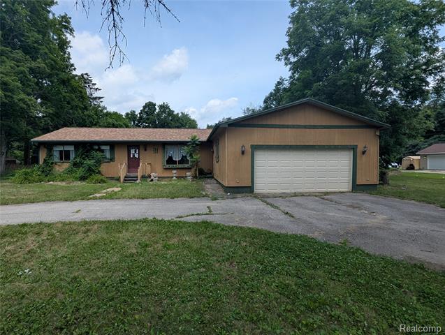 front view picture of 48050 Hull Rd, Belleville, MI. 48111
