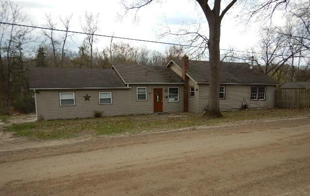 front view picture of 42720 Riggs Rd, Belleville, MI. 48111