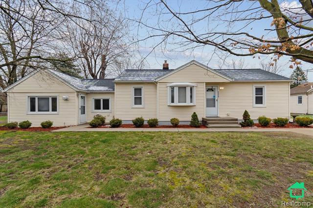 front view picture of 42228 Fret Rd, Belleville, MI. 48111
