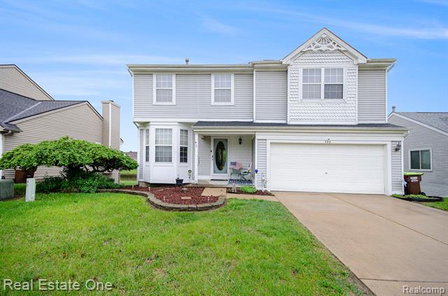 front view picture of 328 Oxford Ct, Belleville, MI. 48111