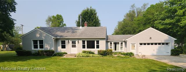 front view picture of 13780 Farm Rd, Belleville, MI. 48111