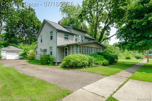 front view picture of 133 Angola St, Belleville, MI. 48111