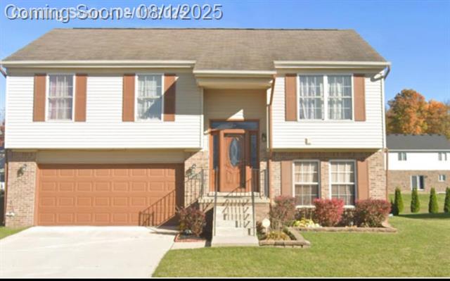 front view picture of 13337 N Cumberland Drive, Belleville, MI. 48111