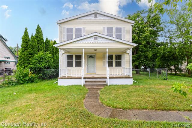 front view picture of 14225 Reeck Rd, Southgate, MI. 48195