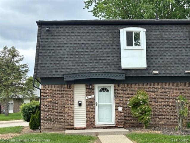 front view picture of 41102 N Woodbury Green Dr, Belleville, MI. 48111