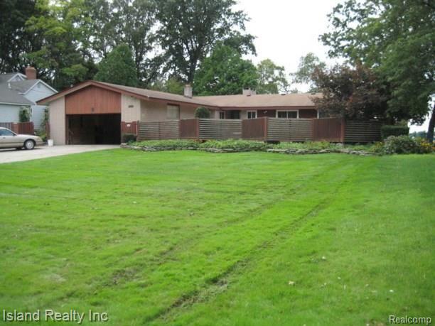front view picture of 28694 Swan Island, Grosse Ile, MI. 48138