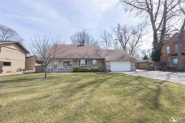 front view picture of 26621 East River, Grosse Ile, MI. 48138