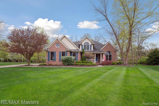 front view picture of 25064 Hazelnut Court, Grosse Ile, MI. 48138