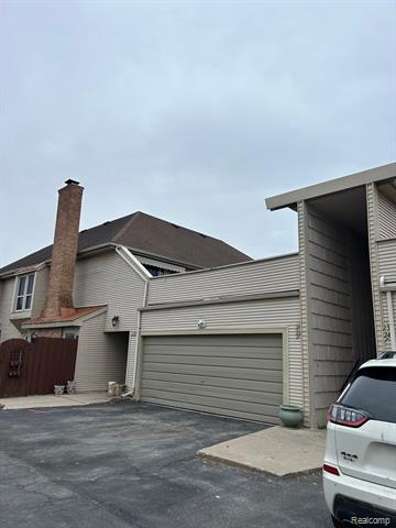 front view picture of 8127 Colony, Grosse Ile, MI. 48138