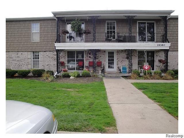 front view picture of 24360 East River, Grosse Ile, MI. 48138