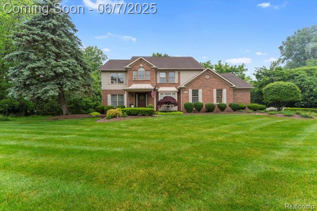 front view picture of 23811 Cadillac Court, Grosse Ile, MI. 48138