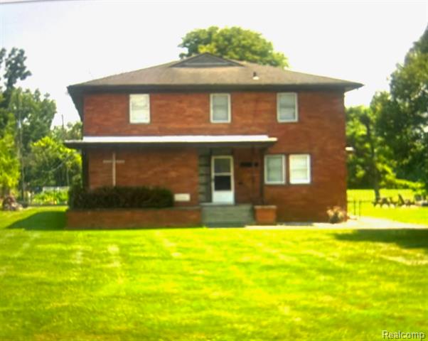 front view picture of 21599 Parke Lane, Grosse Ile, MI. 48138