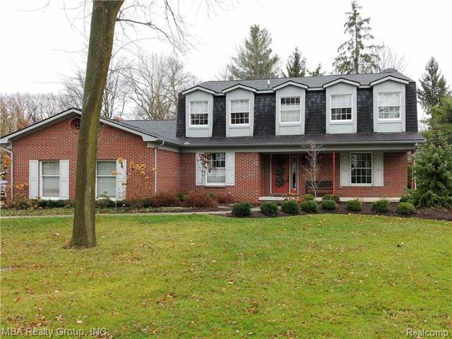 front view picture of 9415 Lakewood, Grosse Ile, MI. 48138