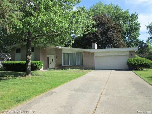front view picture of 8477 Church, Grosse Ile, MI. 48138
