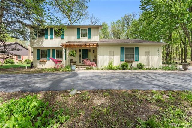 front view picture of 19177 Meridian, Grosse Ile, MI. 48138