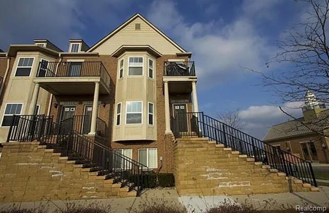 front view picture of 25510 Portico Ln, Novi, MI. 48375