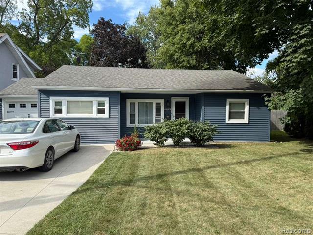 front view picture of 25736 Huron River, Flat Rock, MI. 48134