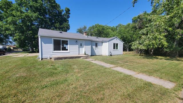 front view picture of 930 W Barney Avenue, Muskegon, MI. 49441