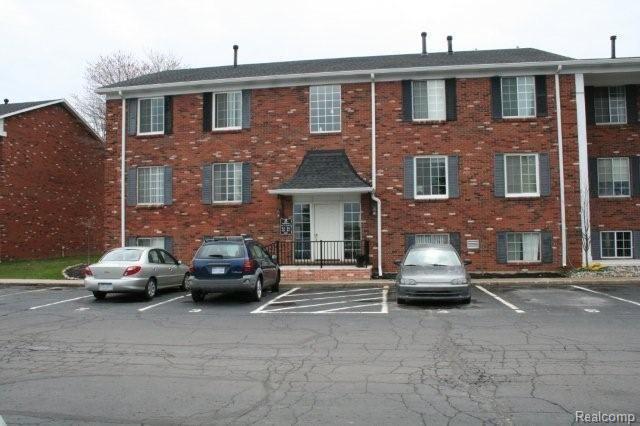 front view picture of 409 W Highland Road, Howell, MI. 48843
