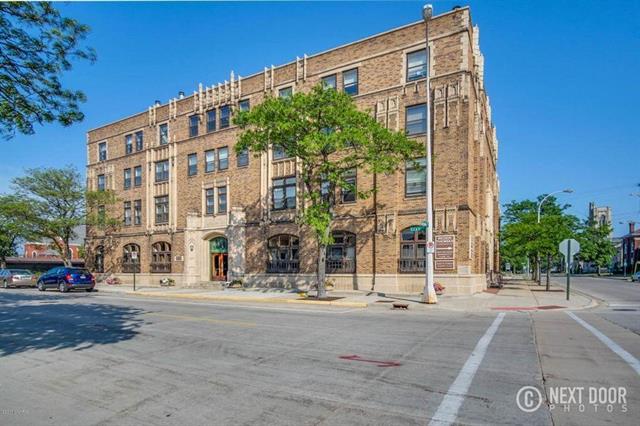 front view picture of 297 W Clay Avenue, Muskegon, MI. 49440