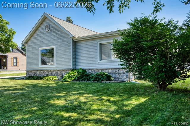 front view picture of 134 2Nd Street, Metamora, MI. 48455