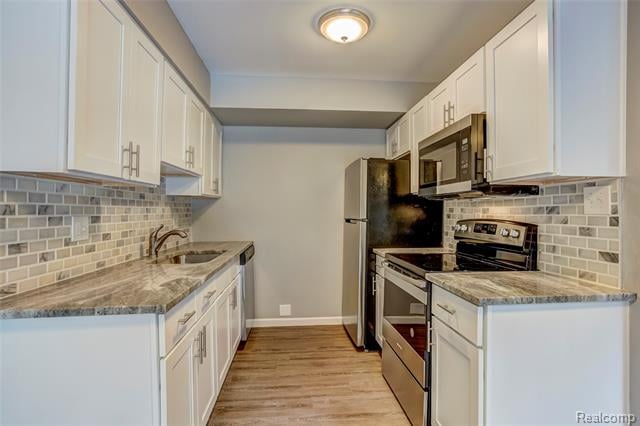front view picture of 2159 Decker Road, Walled Lake, MI. 48390