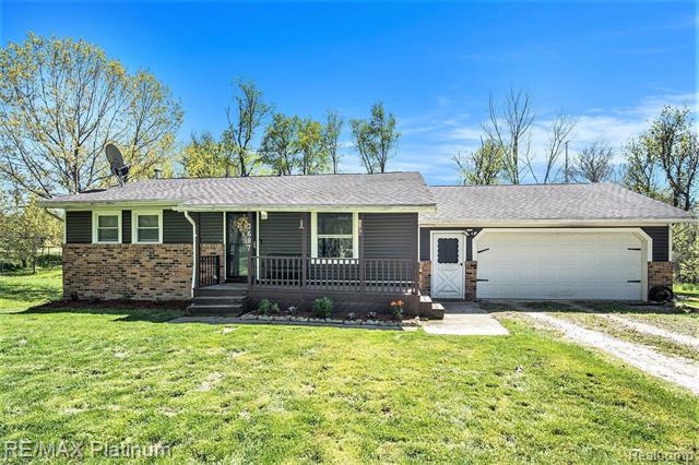 front view picture of 3687 Steinacker Road, Howell, MI. 48855
