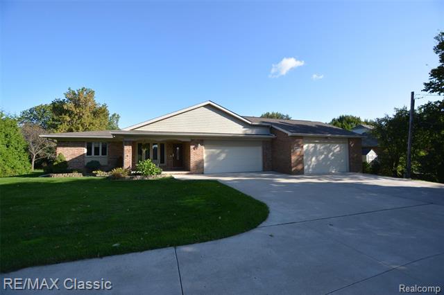 front view picture of 44650 W 11 Mile Rd, Novi, MI. 48375