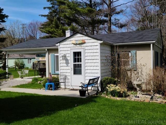 front view picture of 7255 Cottage Lane, Lexington, MI. 48450