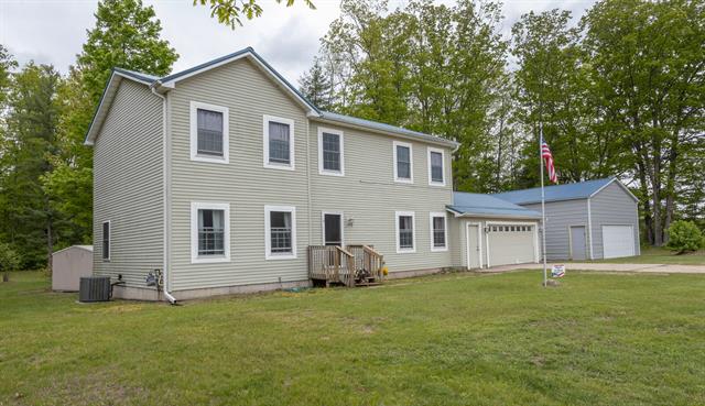 front view picture of 18735 Jefferson Road, Morley, MI. 49336