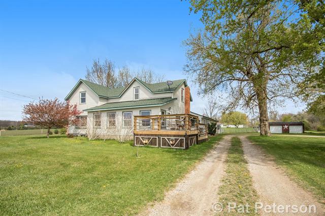 front view picture of 6220 W Stanton Road, Stanton, MI. 48888