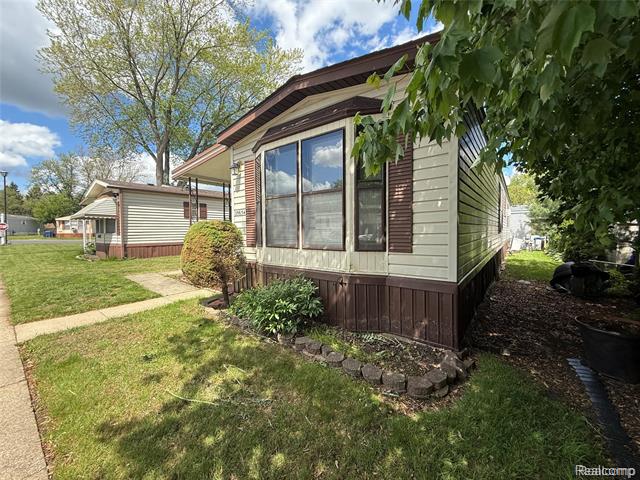 front view picture of 25654 Madison, Novi, MI. 48375