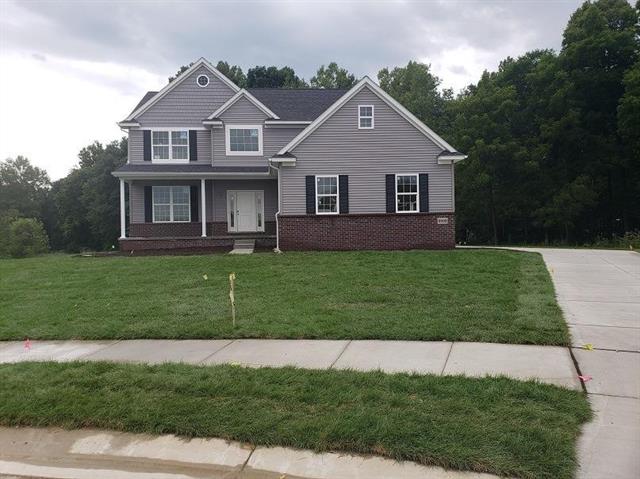 front view picture of 10460 River Edge Road, Saline, MI. 48176