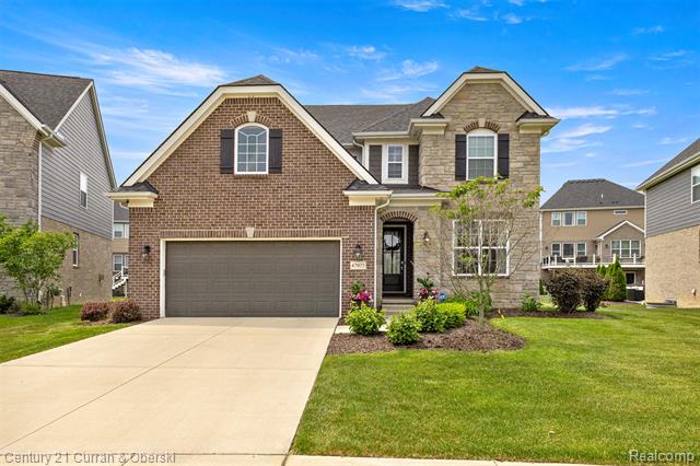 front view picture of 47975 Leland Drive, Northville, MI. 48168