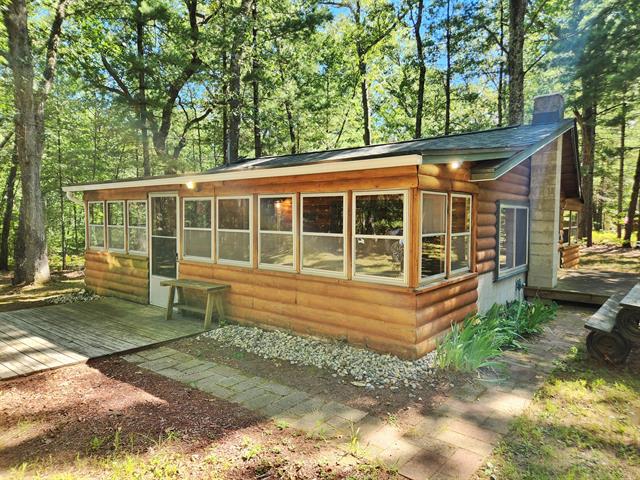 front view picture of 8223 W Cypress Avenue, Baldwin, MI. 49304