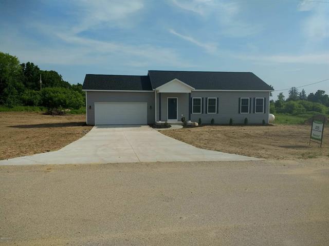 front view picture of 9527 Levi Drive, Clarksville, MI. 48815
